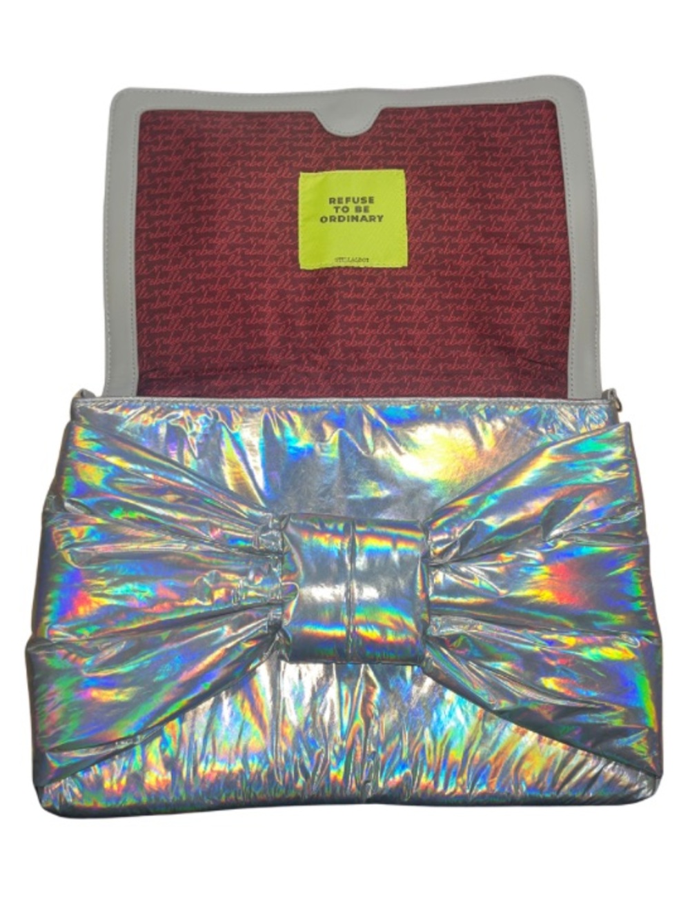 NWOT Stella & Dot
Holographic Metallic Silver Bow Clutch Puffer Bag